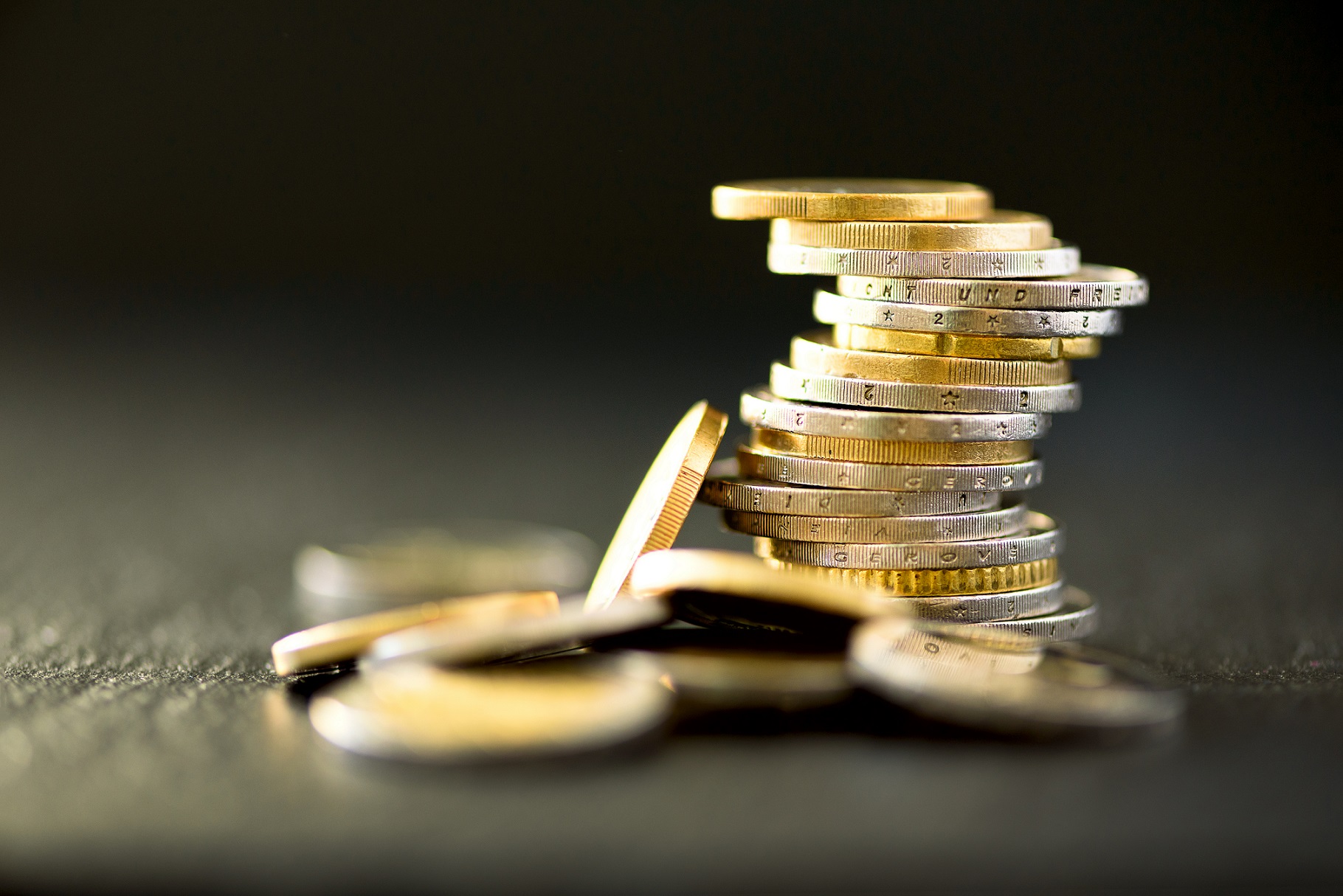 Euro Money, Currency. Success, Wealth And Poverty, Poorness Concept. Euro Coins Stack On Dark Black Background With Copy Space.