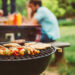 Friends Making Barbecue And Having Lunch In The Nature.