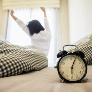 Lady wake up stretch oneself lazily for fresh morning health care concept