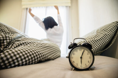 Lady wake up stretch oneself lazily for fresh morning health care concept